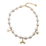 'GINEVRA' PEARLS NECKLACE WITH CHARMS IN GOLD - Ibiza Passion